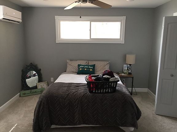 Bedroom with walk-in closet