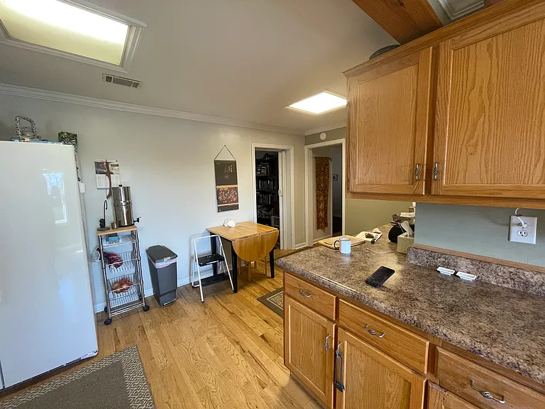 View of dining area in kitchen. Can accommodate a decent sized table.