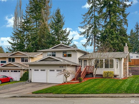 So many upgrades throughout the home, including newer garage doors, new front door & well maintained roof