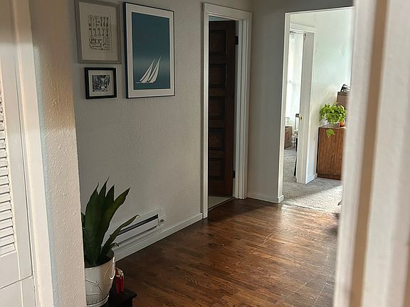 Hardwood floors at the top floor landing.