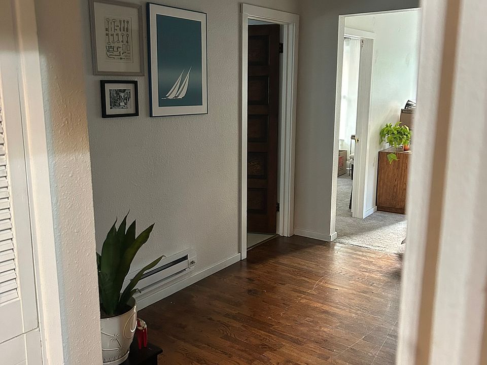 Hardwood floors at the top floor landing.