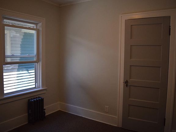 Bedroom 2 - new ceiling fan, one window, and closet