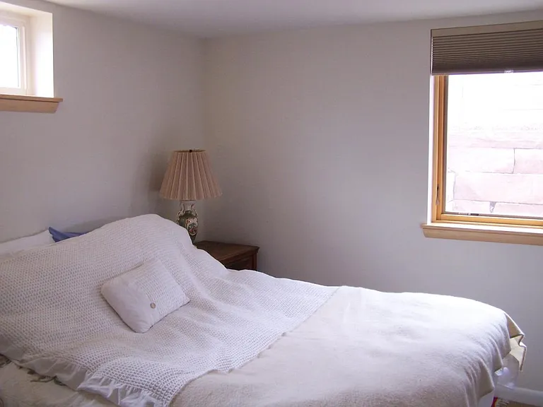 Downstairs master bedroom showing furniture