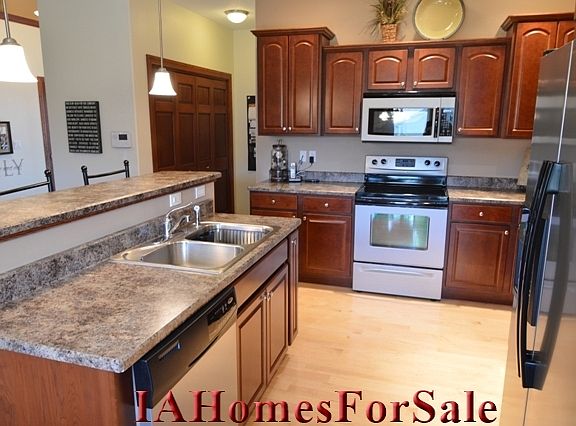 Kitchen-all stainless appliances in kitchen stay, 9ft ceilings in kitchen