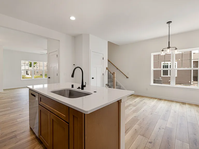 Kitchen Opens to Dining Room - Large Island, Breakfast Bar Seating, Abundant Cabinet Space & Stainless Steel Appliances!