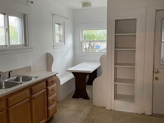 Kitchen & Breakfast nook area- ample storage with lots of natural light.