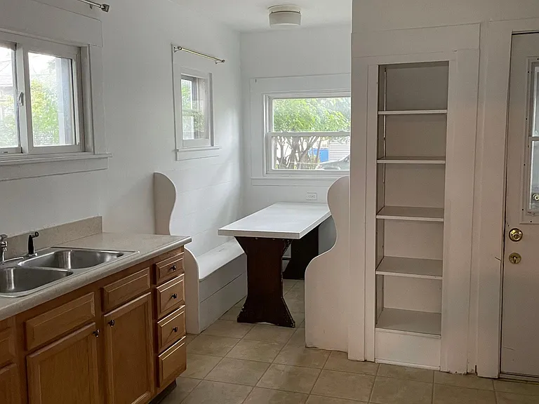 Kitchen & Breakfast nook area- ample storage with lots of natural light.