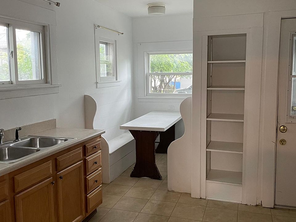 Kitchen & Breakfast nook area- ample storage with lots of natural light.
