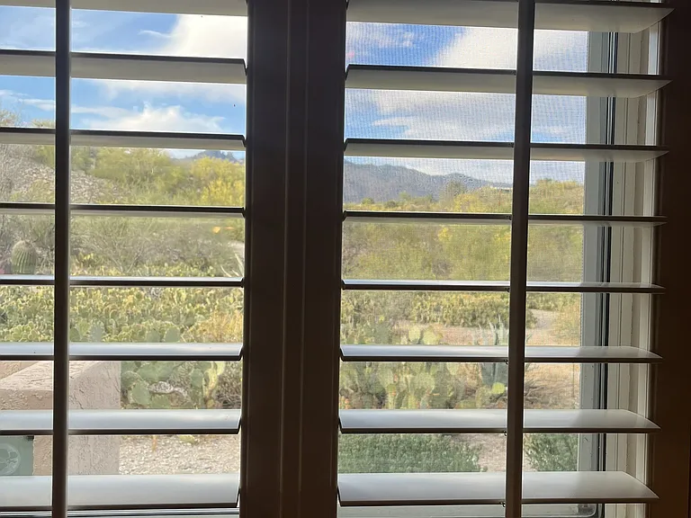 kitchen window above sink to Catalina Mountains
