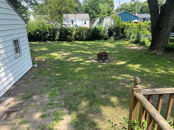 Side of house and backyard