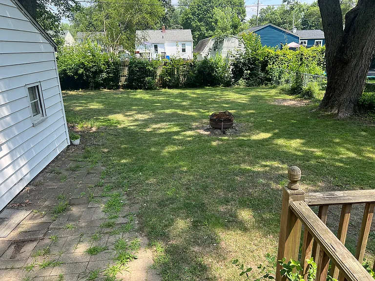 Side of house and backyard