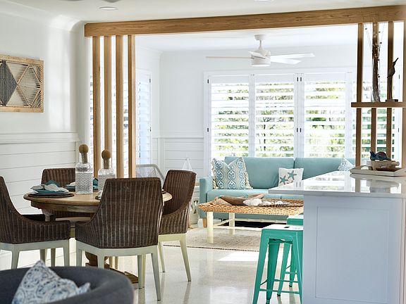 Open concept living, dining and sunroom (Furniture not included).