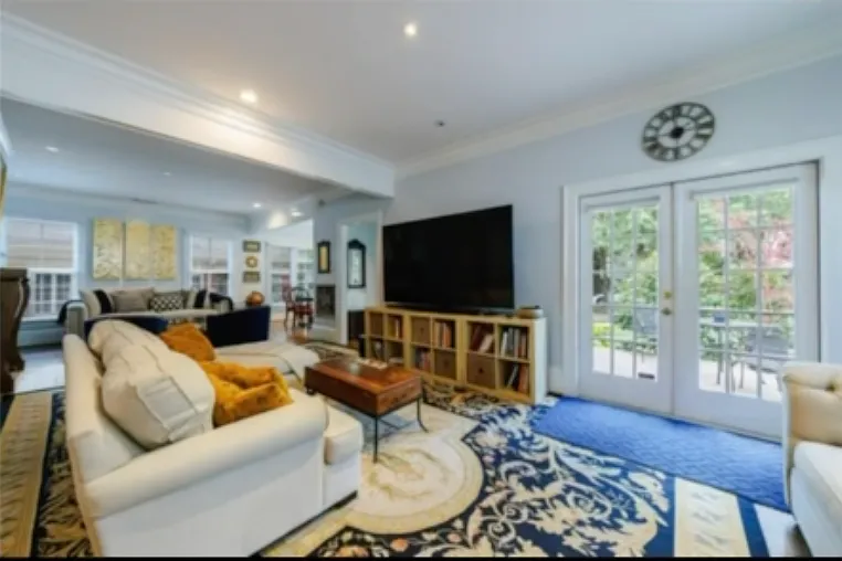 Living room - french front doors open to front porch