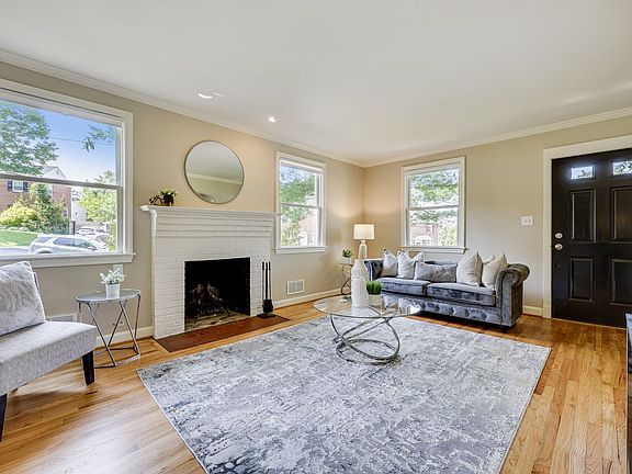 Living Room with Wood Burning Fireplace