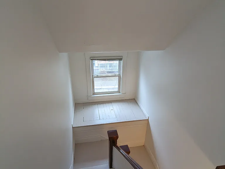 Staircase with windowbox nook