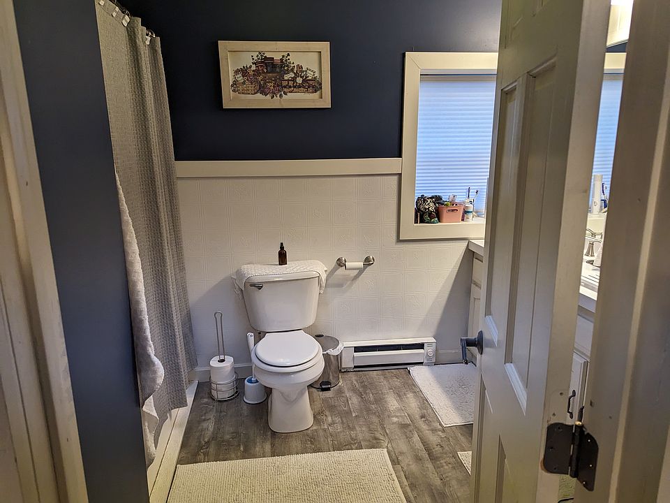 Bathroom with full shower and tub and a double vanity