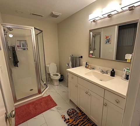 One of 2 full bathrooms in house. A half bath is also available for guests.
