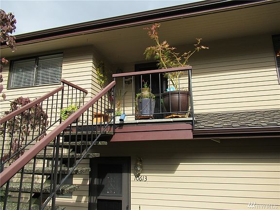 Safe and secure elevated entrance with eleven steps. Parking right out front.