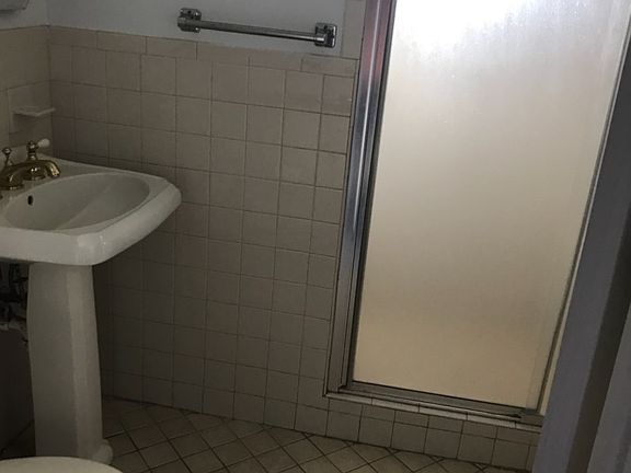 One of 2 bathrooms  in main house