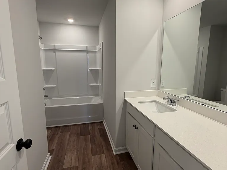Second floor bathroom with shower/tub combo