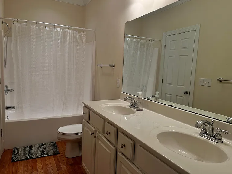 Main floor bathroom - access from bedroom and hallway