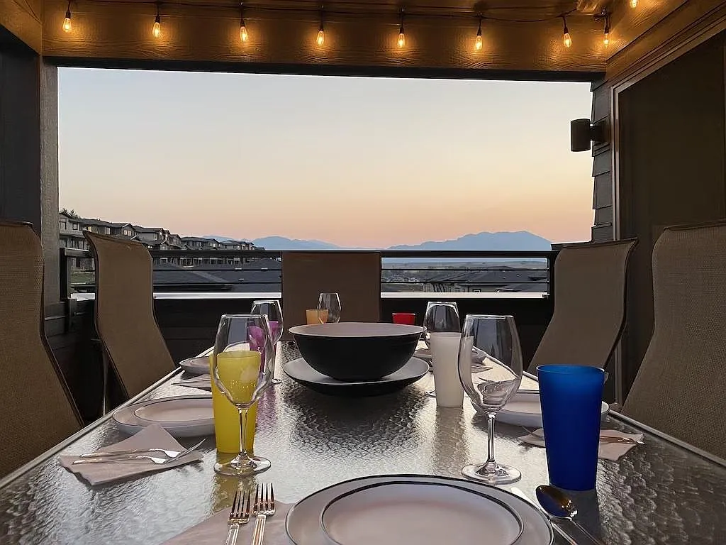 Rooftop looking west. Table for 8 with dinnerware. - 408 Promenade Dr #408