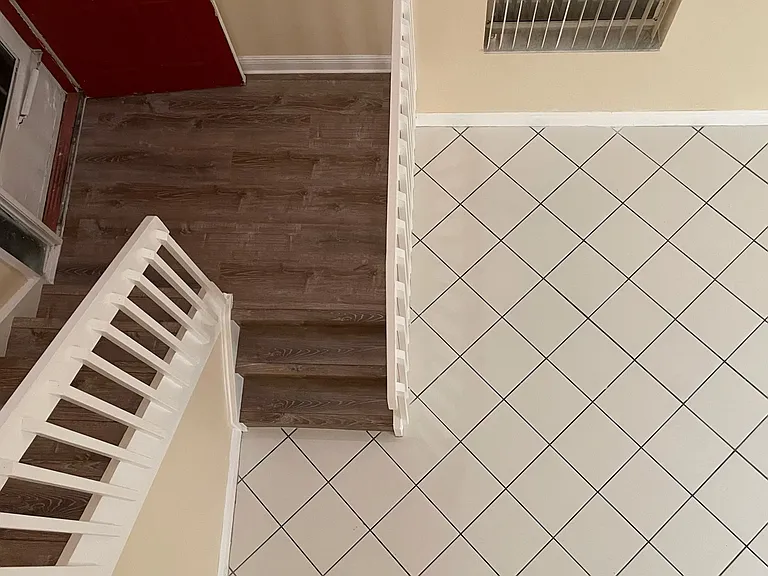Stairs and Entry View - Previous Listing Picture