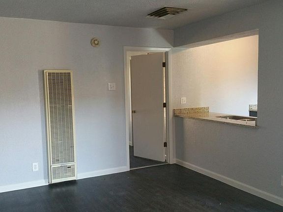 View from living room towards kitchen and bedroom