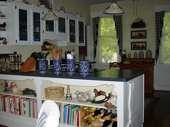 Upgraded Kitchen with Etched Glass Cabinets & Solid Surface Countertops