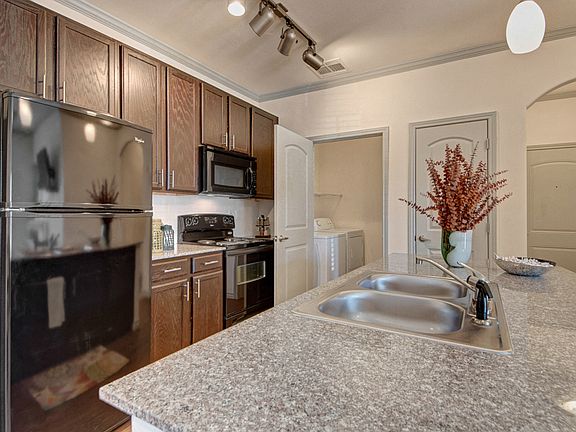 Laundry Room with Full Size Washer and Dryer