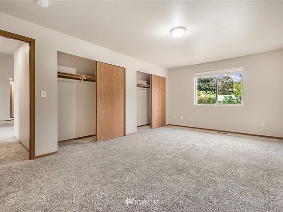 Grand sized primary suite includes abundant closet space and its own private ensuite. 