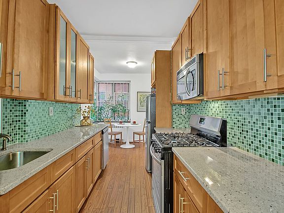 5th image of 102-40 67th Dr APT 1E