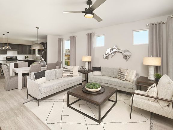 Beautiful, open Gathering Room near the Kitchen, perfect for entertaining guests.