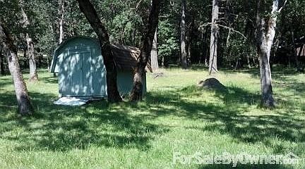 30 x 36 ft wood heated shop
						:
						Shop has double 50 gal barrel wood stove
