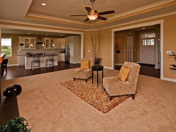 The living area opens into a bright and fun kitchen.