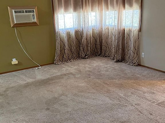 Living Room with AC. The apartment has central air.