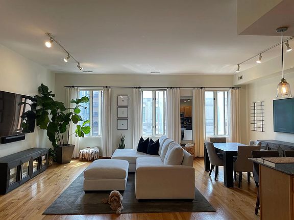 Bright and airy living space with hardwood Floors