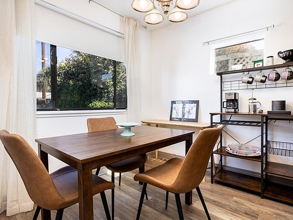 Breakfast zone in Kitchen has console and powered coffee and tea station for open storage