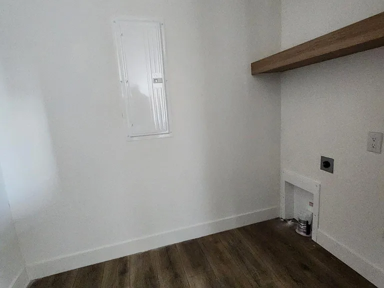 Laundry room ready for you to bring your own washer and electric dryer.