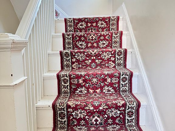 The front door entrance leads you to your new home