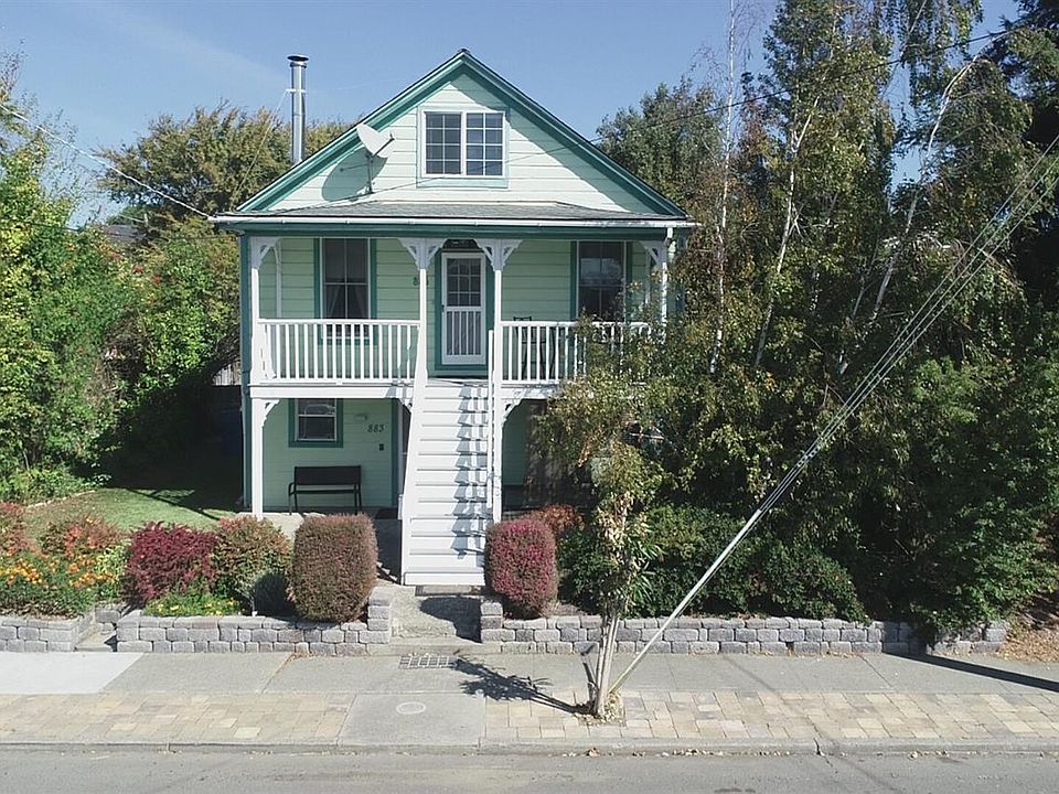 Front yard has been changed with additional privacy measures.