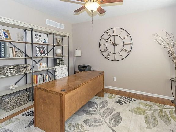 Main level office with French doors.