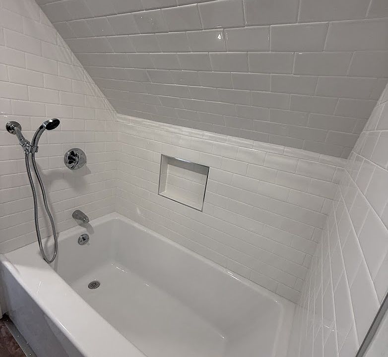 SOAKER TUB only no shower- ceiling slope does not have room for a shower.