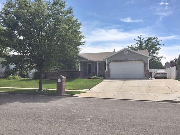 Front of House with RV Pad