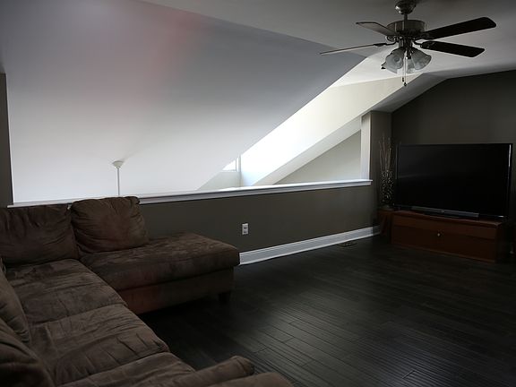 Loft Area/Entertainment Room overlooking the living room wit