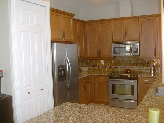 Custom kitchen, stainless, granite, and custom backsplash