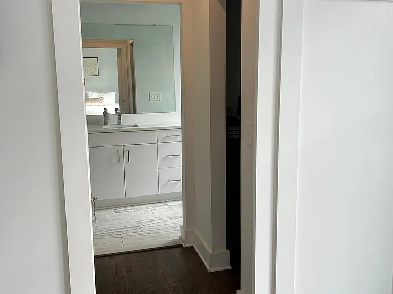 Master bath with two separate closets