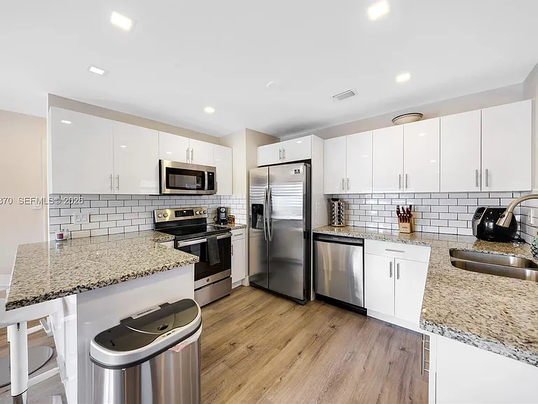 5612 NW 11th Ave — Photo 12