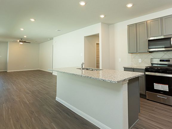 Dining Area to Kitchen and Family Room