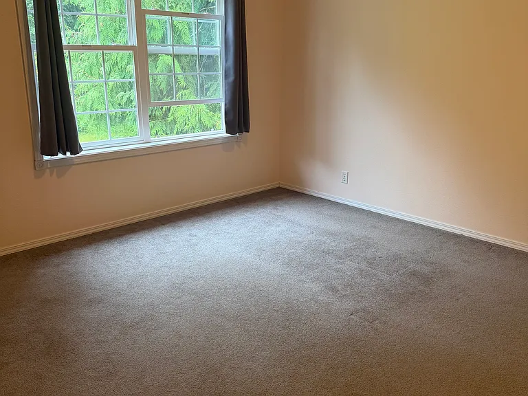 One of two similar bedrooms